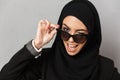 Portrait closeup of stylish muslim woman 20s in hijab smiling an Royalty Free Stock Photo