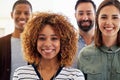 Portrait, collaboration or leadership with a manager black woman standing with her team at the office. Management