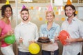 Portrait of colleagues enjoying birthday party Royalty Free Stock Photo