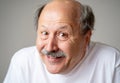 Portrait of comic and crazy senior man with funny face Royalty Free Stock Photo