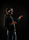 Computer hacker in virtual reality headset. Man in VR helmet. Data thief, internet fraud, darknet and cyber security Royalty Free Stock Photo