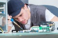 Portrait computer repairman frowning Royalty Free Stock Photo