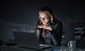 Portrait of concentrated businesswoman in glasses