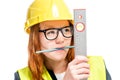 portrait of a concentrated foreman with a ruler and a pencil in Royalty Free Stock Photo