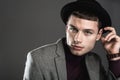 Focused man wearing modern hat Royalty Free Stock Photo