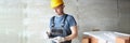 Concentrated male worker hold clipboard and write down needed work material for renovation Royalty Free Stock Photo