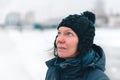 Portrait of concerned woman in snowy outdoors