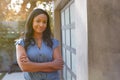 Portrait Of Confident African American Woman In Garden At Home Against Flaring Sun Royalty Free Stock Photo