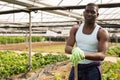 Portrait of confident Afro male farmer