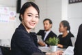 Portrait of Confident Asian business woman sitting in the office. Royalty Free Stock Photo