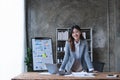 Portrait confident asian business woman standing at her desk on office Royalty Free Stock Photo