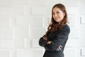 Portrait of a confident Asian business woman standing over white Royalty Free Stock Photo