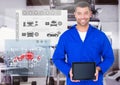 Portrait of a confident automobile mechanic holding digital tablet Royalty Free Stock Photo