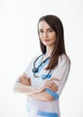 Portrait of confident beautiful doctor with arms crossed Royalty Free Stock Photo