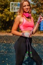 Portrait of confident beautiful sporty woman with slim waist Royalty Free Stock Photo