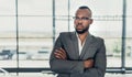 Portrait of a confident black businessman standing with his arms crossed Royalty Free Stock Photo