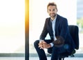 Portrait, confident and business man sitting in chair for career pride, smiling or happiness in office. Professional Royalty Free Stock Photo