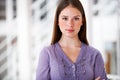 Portrait, confident and a business woman arms crossed in her professional office for an internship. Mindset, serious and Royalty Free Stock Photo