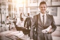 Portrait of confident businessman holding documents Royalty Free Stock Photo