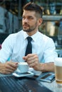 Portrait of confident businessman outdoors in cafe Royalty Free Stock Photo