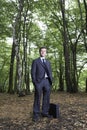 Portrait Of Confident Businessman Standing In Forest Royalty Free Stock Photo