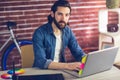 Portrait of confident businessman using laptop Royalty Free Stock Photo