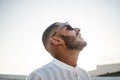 Portrait of a confident and casual man, modern muslim wearing sunglasses