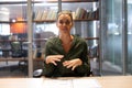 Portrait of confident caucasiian businessswoman gesturing and explaining agreement at desk