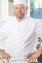 Portrait of confident chef in large kitchen Royalty Free Stock Photo