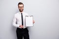 Portrait of confident cool executive collar man hold clipboard show his work start-up result point pen paper wear white Royalty Free Stock Photo