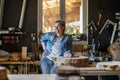 Portrait of confident craftswoman in her workshop Royalty Free Stock Photo
