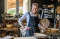 Portrait of confident craftswoman in her workshop Royalty Free Stock Photo
