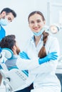 Portrait of a confident female dentist looking at camera in the