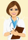 Portrait confident female doctor medical professional taking patient notes Royalty Free Stock Photo