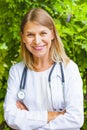 Smiling female doctor outdoor Royalty Free Stock Photo