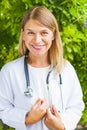 Smiling female doctor outdoor Royalty Free Stock Photo