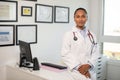 Portrait of confident female general practitioner in office Royalty Free Stock Photo