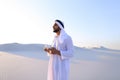 Wonderful beginning of morning for Arab guy in middle of huge de Royalty Free Stock Photo