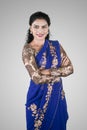 Confident Indian woman wearing saree dress