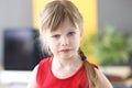 Portrait of confident little girl with blond hair Royalty Free Stock Photo