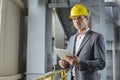 Portrait of confident male architect holding digital tablet in industry Royalty Free Stock Photo