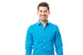 Confident Male Wearing Blue Shirt On Plain Background Royalty Free Stock Photo