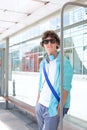 Portrait of confident man waiting at bus stop Royalty Free Stock Photo