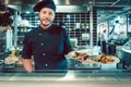 Portrait of a confident master chef holding two plates with tasty food