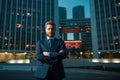 Portrait of a confident mature businessman standing outside office. Smiling business man CEO standing with arms crossed Royalty Free Stock Photo