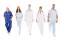 Portrait Of Confident Medical Team Walking In Row Royalty Free Stock Photo