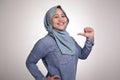 Confident Muslim Lady Smiling and Pointing Herself