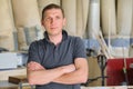 Portrait of confident owner of industrial small business carpenters workshop, man with crossed arms Royalty Free Stock Photo