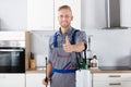 Confident Pest Control Worker With Pesticide Container Royalty Free Stock Photo