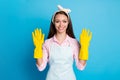 Portrait of confident professional cleaner worker show her protective yellow latex gloves ready prevent covid virus Royalty Free Stock Photo
